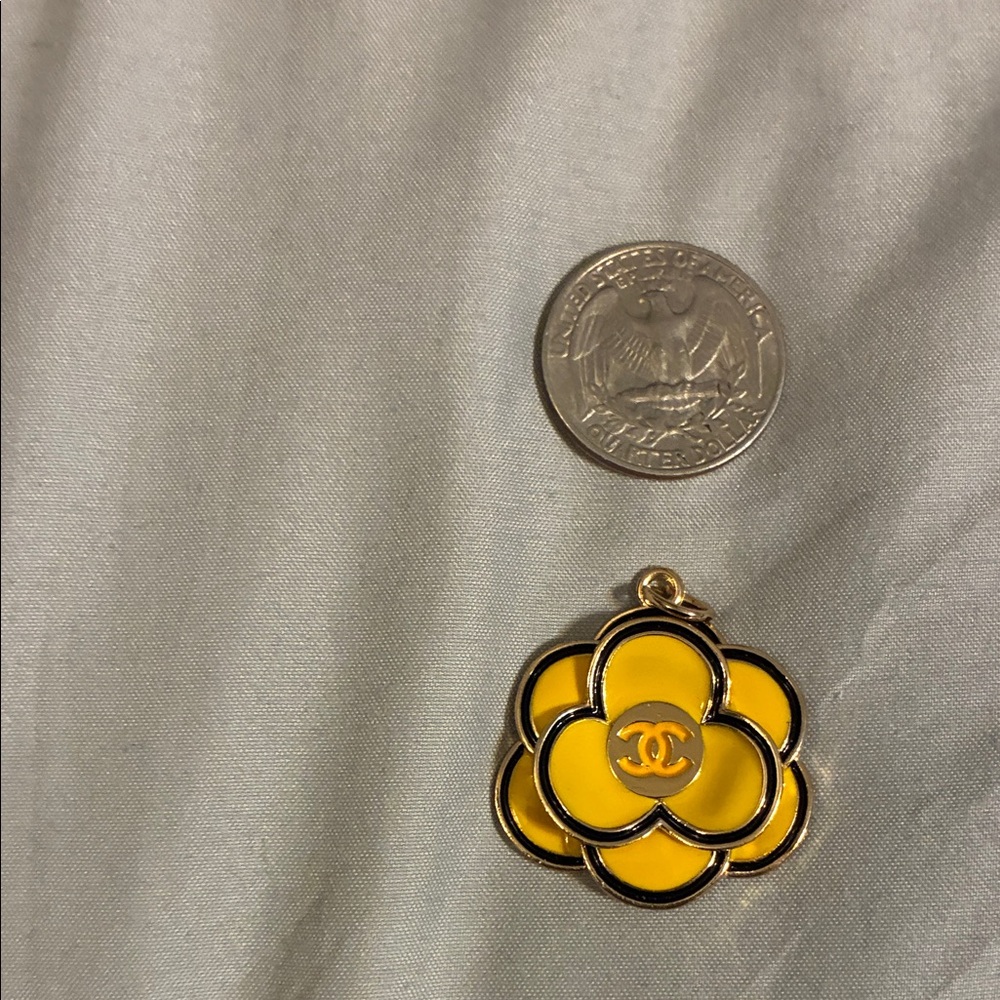 CHANEL Gold and Yellow Floral Pendant